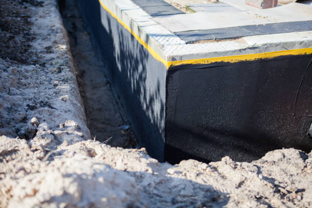 Professional Waterproofing technician working in Saddle Brook, NJ